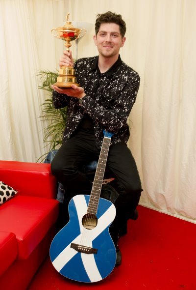 Sam McTrusty from Twin Atlantic with The Ryder Cup Trophy