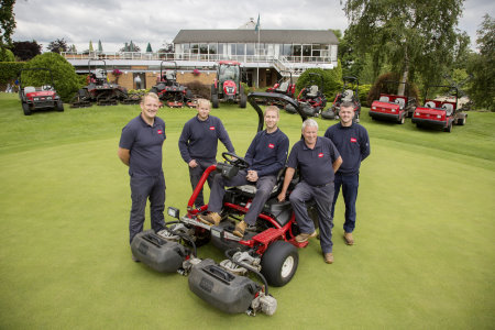 Course manager Kevin Brown, seated, with four members of the greenkeeping team