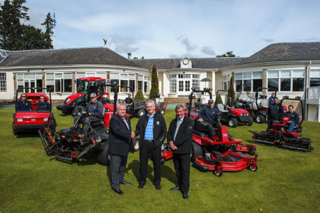 Scott Fenwick, centre, with Lely UK’s account manager Trevor Chard, left, Scott McNeil from Henderson Grass Machinery and the greenkeepers with Toro equipment looking on