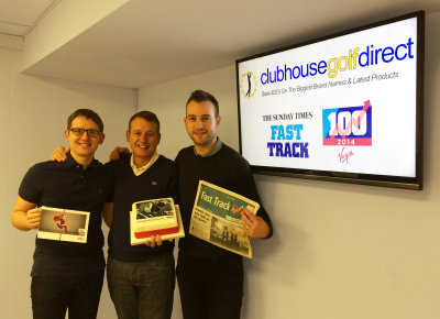 Paul Reeves flanked by his sons and fellow directors Sam (left) & Ben with a Fast Track   celebration cake sent by The Sunday Times
