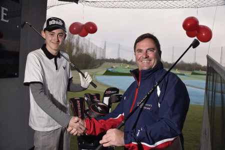 World of Golf Master Professional Jon Woodroffe (right) with golfer Callum Elliott ahead of his 50,000th lesson
