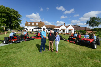 Ray Clarke, left, with Sara Stubbings and Lely’s Richard Freeman