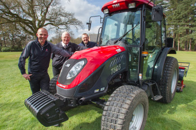 Courses manager Sam Rhodes (left) with Lely’s Nigel Lovatt and Chris Sellars from Chris Sellars Groundcare, next to the club’s new TYM T603
