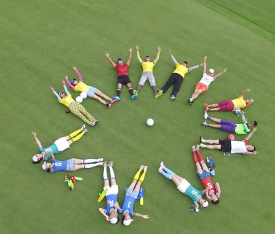 Players and fans are pictured to form a football-shaped ball in support for China’s first Footgolf championship at Mission Hills Shenzhen (photograph by Vincent Chu/Mission Hills)