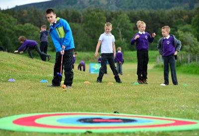 Macdonald Hotel Resorts - children practicing their golf skills