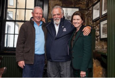 Neil Paton, accompanied by Mr and Mrs Herb Kohler, at his leaving reception in the Jigger Inn at the Old Course Hotel, Golf Resort and Spa