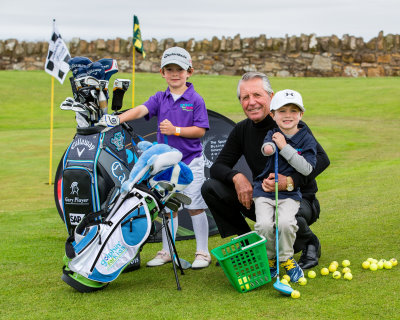 Jack Dirkin, Gary Player, Tommy Morrissey

Junior golf sensations Jack Dirkin (5) and Tommy Morrissey (4) got to meet golf legend Gary Payer in St Andrews as they tried out new revolutionary kids golf clubs designed in Scotland.

Five-year-old Jack from Shropshire, the UKs number one Under-5 golfer, has qualified for the World Under-6 championships in Pinehurst, Carolina, at the end of July 2015. Mean while Tommy, from Florida, who is already an internet and tv star due to his golfing ability despite being born without a right hand and lower arm.

Golphin for Kids is a Scottish company whoes founder Calum McPherson invented a light weight golf club with a larger sweet spot to make it easier for kids to hit the ball well.

Picture by John Young © www.youngmedia.co.uk 2015