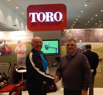 President SAGCA - Ted Parslow, left, shakes hands over a long term deal with Managing Director Toro Australia - Richard Walne