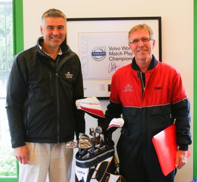 Dennis Excell on the right is presented his retirement gift of a set of golf clubs by Peter Todd, course manager at London Golf Club.