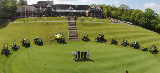 The new John Deere machinery fleet lined up at Woodbury Park Golf Club, with (left to right) Masons Kings group turf sales manager Andrew Bowey, joint owners of Woodbury Sue & Robin Hawkins, John Deere territory manager Philip Tong, Woodbury’s golf course & estate manager Ian Chenery and Masons Kings turf sales consultant Lee Kirk