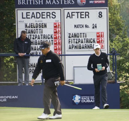 Matthew Fitzpatrick consult The Green Book on his way to victory in The British Master at Woburn