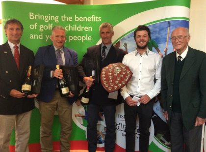 Winning Pro-Am team ‘The Kent Massive’ receives The Wickham Shield from The European Tour’s Hugh Wickham