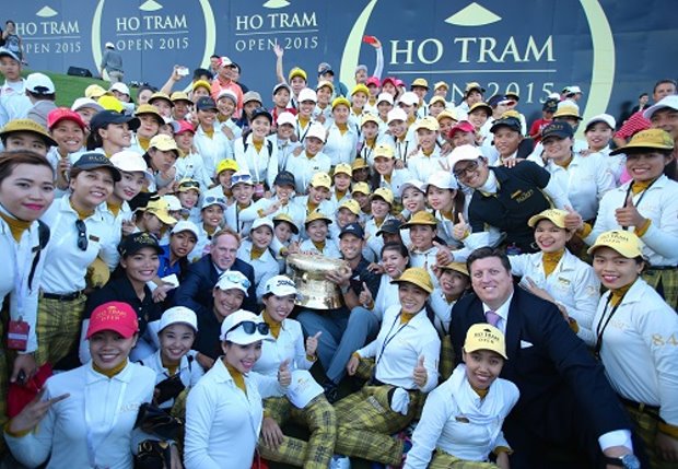 Sergio Garcia celebrates with staff and volunteers at The Bluffs