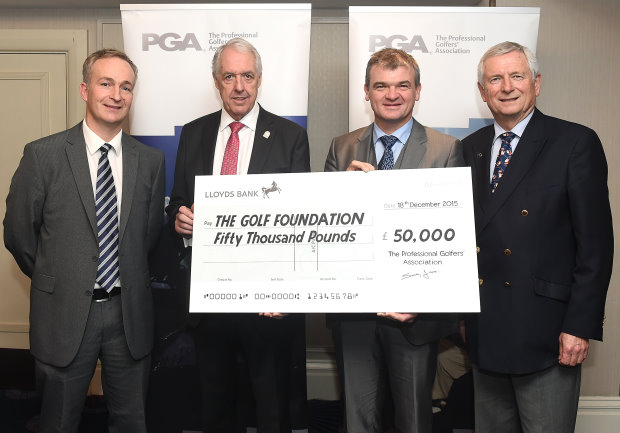 LONDON, ENGLAND - DECEMBER 18: L-R: Brendon Pyle, PGA Captain Nicky Lamb, Paul Lawrie and Charles Harrison pose with the Golf Foundation cheque  during the PGA Lunch at Grosvenor House Hotel on December 18, 2015 in London, England. (Photo by Tom Dulat/Getty Images). *** Local Caption *** Brendon Pyle; PGA Captain Nicky Lamb; Paul Lawrie; Charles Harrison