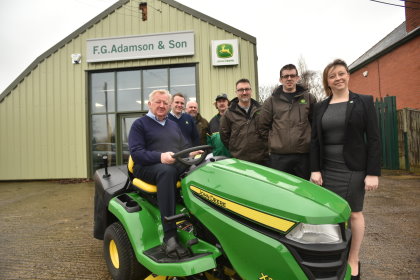 (from left): Dealer principal John Adamson (Snr), Steve Blanchard (sales), Fran Firth and Tim Holden (service), Darren Lunn (sales), Carl Dannatt (parts) and Gillian Jenkins (accounts) at the new F G Adamson & Son dealership outlet in Langworth, near Lincoln