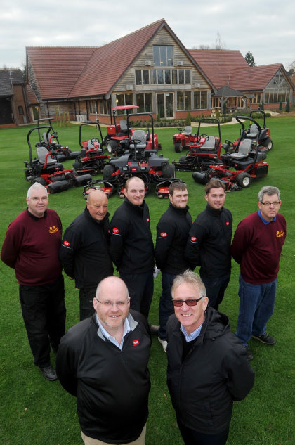 Adrian Hurst, managing director at Tydd St Giles, front right, with Lely’s Julian Copping and the club’s greenkeepers