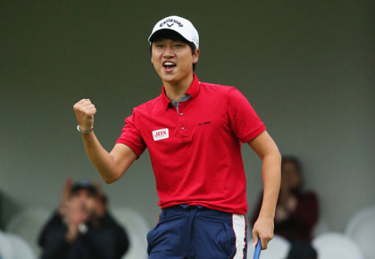 Jeunghun Wang of Korea celebrates a birdie putt on the first hole (18th) of the play off with Nacho Elvira of Spain during the fourth and final round of the Trophee Hassan II at Royal Golf Dar Es Salam on May 8, 2016 in Rabat, Morocco. (Photo by Andrew Redington/Getty Images)