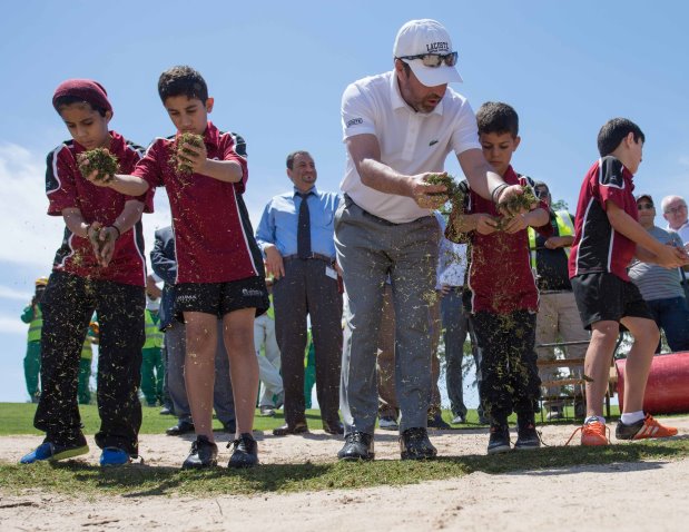Jose Maria Olazabal grasses the first green