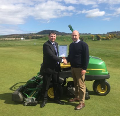 SRUC Elmwood HNC Student of the Year Award 2016 winner Peteris Sadovskis (left) with John Deere dealer Sandy Armit of The Double A Trading Company Ltd.