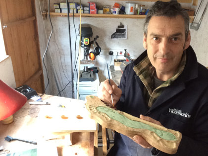 Nick Gibbs working on a recent commission of the 18th at Pebble Beach