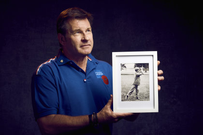 Sir Nick Faldo with a portrait of Albert Tingey, a founding member of The PGA who founded the Niblick Brigade which fought in the Great War (image courtesy of the Royal British Legion)
© Mikael Buck / Royal British Legion