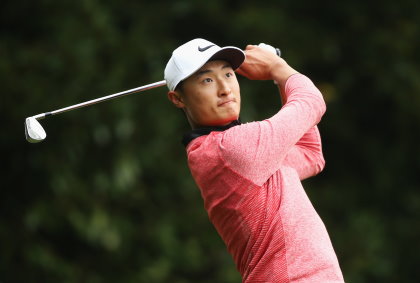 Li Haotong of China tees off on the 2nd hole during day four of the BMW PGA Championship at Wentworth  (Photo by Andrew Redington/Getty Images)