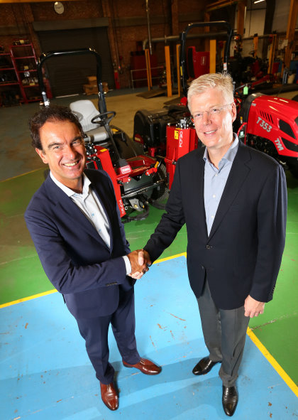 Gerrit van der Scheer, CEO of Royal Reesink (left) shakes hands on the acquisition of Lely Turfcare with CEO of Lely Holding Alexander van der Lely
