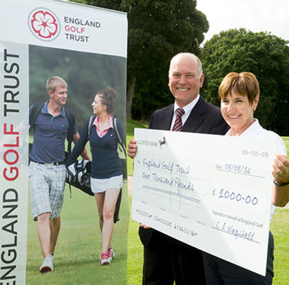 The cheque was presented to chairman Di Horsley from England Golf President-elect John Williams (© Leaderboard Photography)