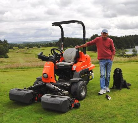 Head Greenkeeper, Jim Lyons with the Jacobsen Eclipse 322 and loyal companion, Sheba