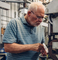 John Solheim grinding Anser putter

