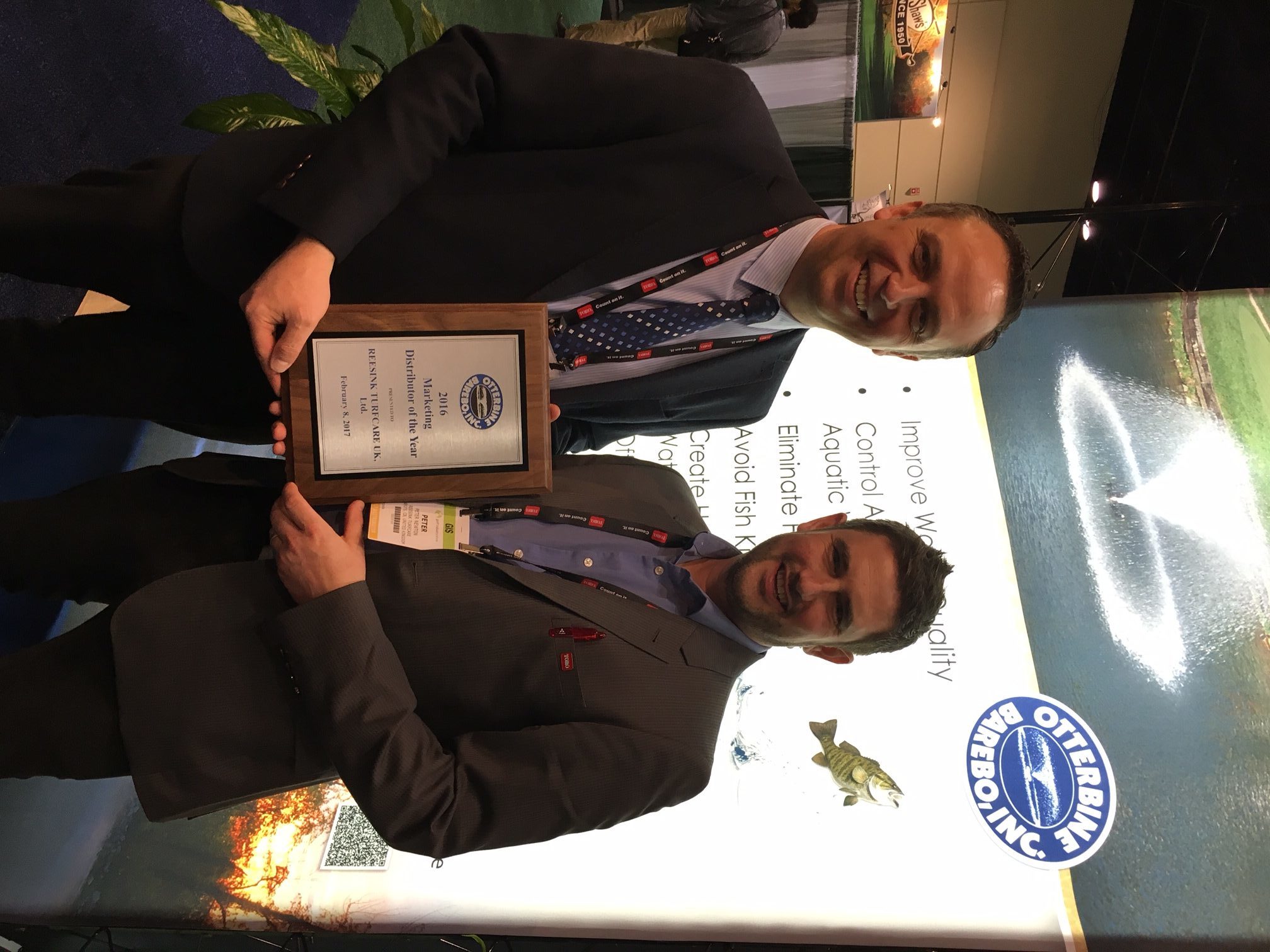 Reesink Turfcare’s irrigation field sales manager Robert Jackson, right, and field sales representative Peter Newton with the award