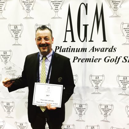Waterville golf shop manager Brian Higgins with the award