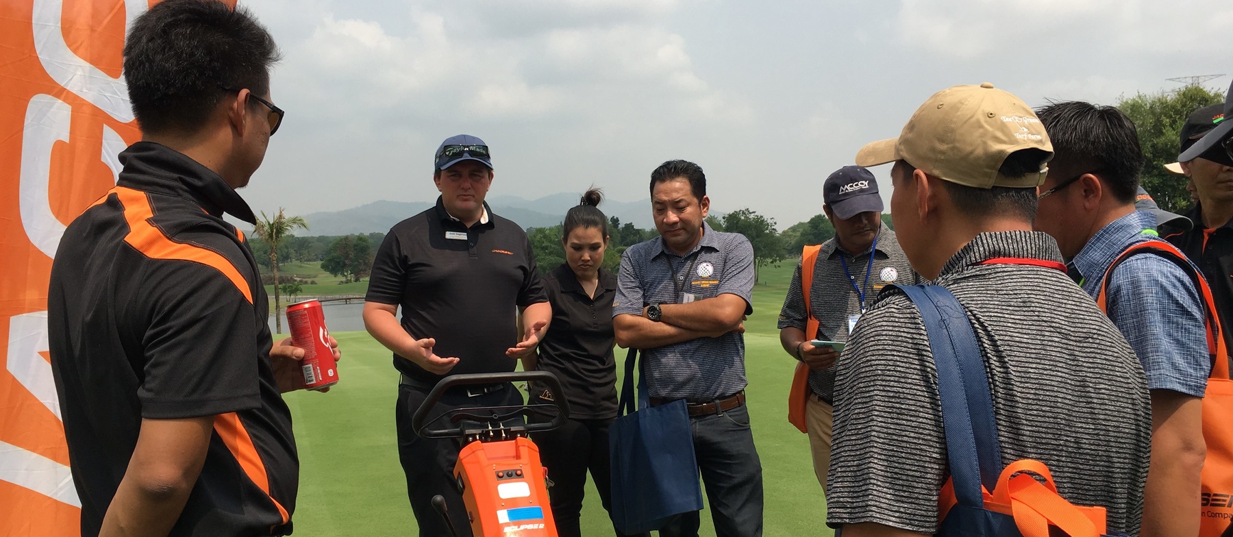 Josh Gagnuss, Product Support Manager for Jacobsen, demonstrating the Eclipse2 innovative frequency of cut adjustment system