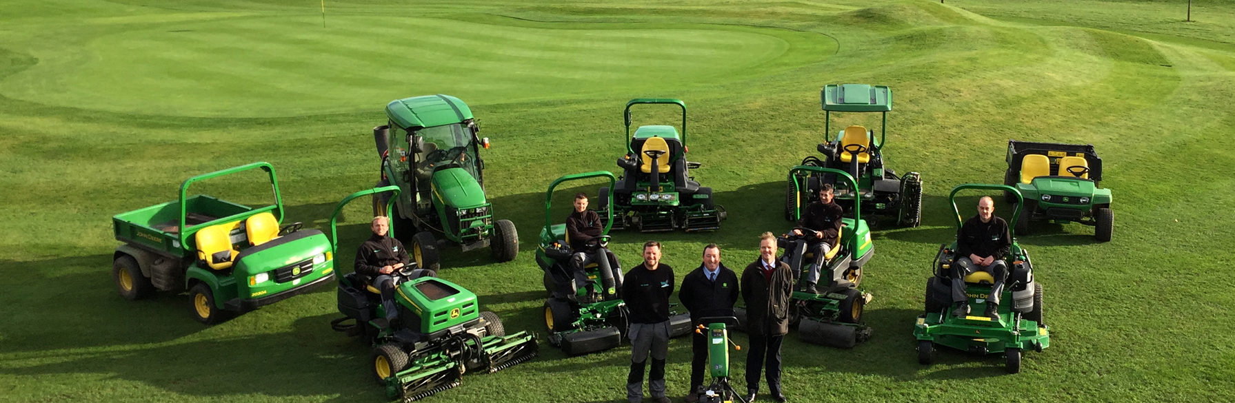 (Front left to right) Waltham Windmill Golf Club’s head greenkeeper Robert Welford, Tony Jenkins of John Deere dealer F G Adamson & Son and club proprietor Niel Strawson, with the greenkeeping staff and their new machinery fleet