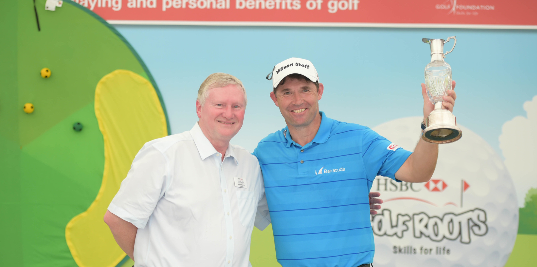 Chairman Stephen Lewis presents Spirit of Golf Award trophy to  Padraig Harrington