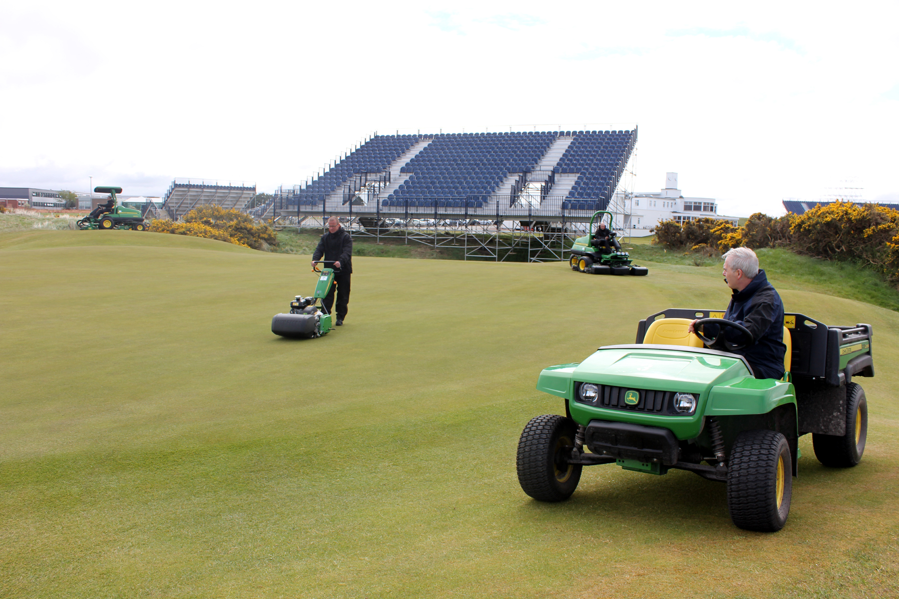 Royal Birkdale Golf Club course manager Chris Whittle (foreground), with examples of the new John Deere machines that are helping to prepare the course for the 146th Open Championship in July