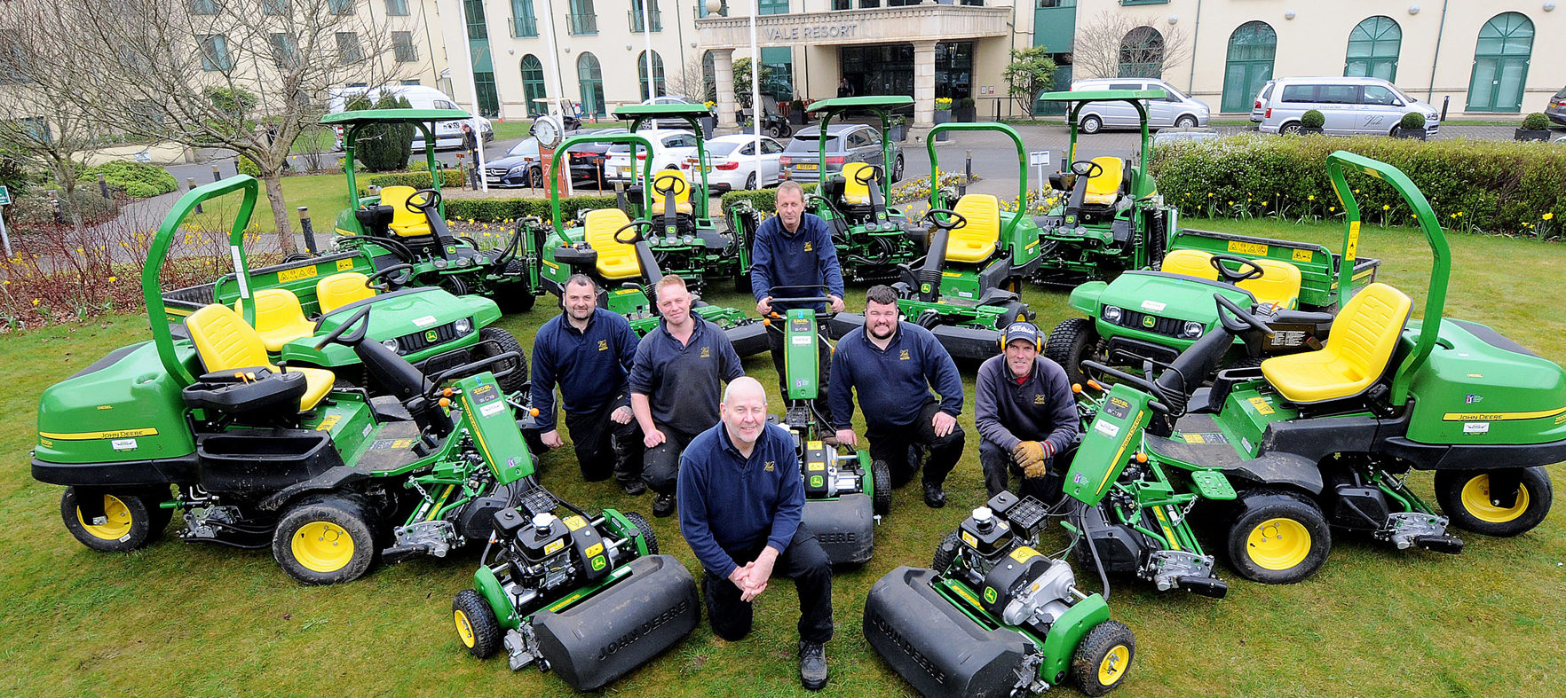 The Vale Resort’s greenkeeping, sports and estates administrator Kim Chilton (front), with some of the greenkeeping staff and their new John Deere machines