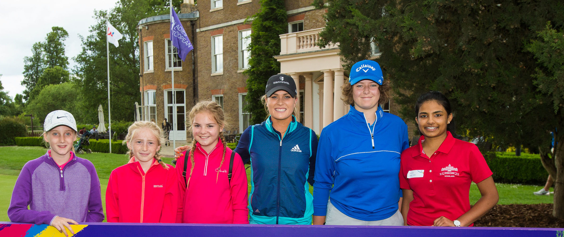 Annabel Dimmock with young golfers after a Q & A session. (Tristan Jones)