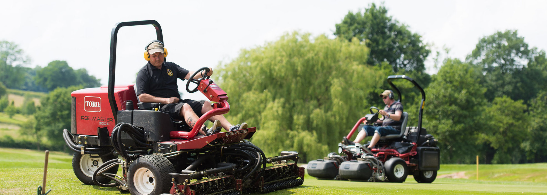 Ian Meakin, head greenkeeper, demonstrates cutting bunkers with the Toro Reelmaster 3100-D with Sidewinder