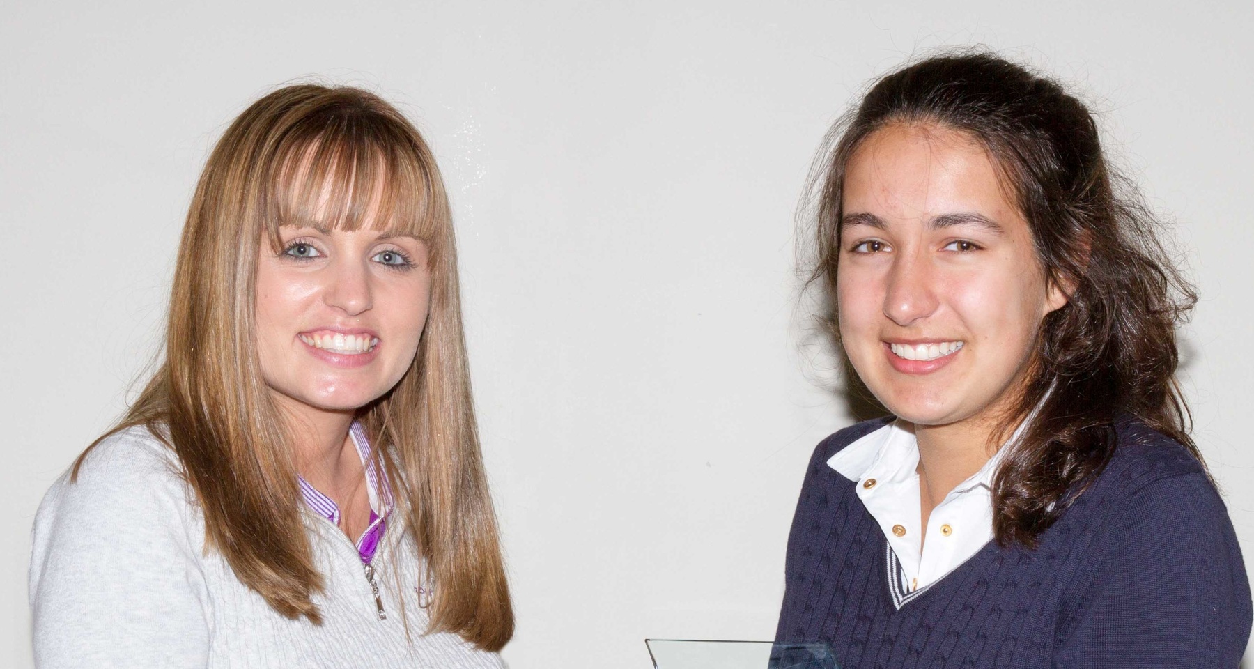 Golf Foundation's Stacey Mitchell (left)  presents to Hannah