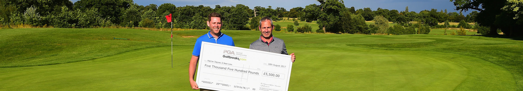 TOWCESTER, ENGLAND - AUGUST 18:  Martyn Jobling of Morpeth Golf Club and  David Clark of Morpeth Golf Club winners of the Golfbreaks.com PGA Fourball Championship pose with the winners cheque during the Golfbreaks.com PGA Fourball Championship - Day 3 at Whittlebury Park Golf &amp; Country Club on August 18, 2017 in Towcester, England.  (Photo by Tony Marshall/Getty Images)