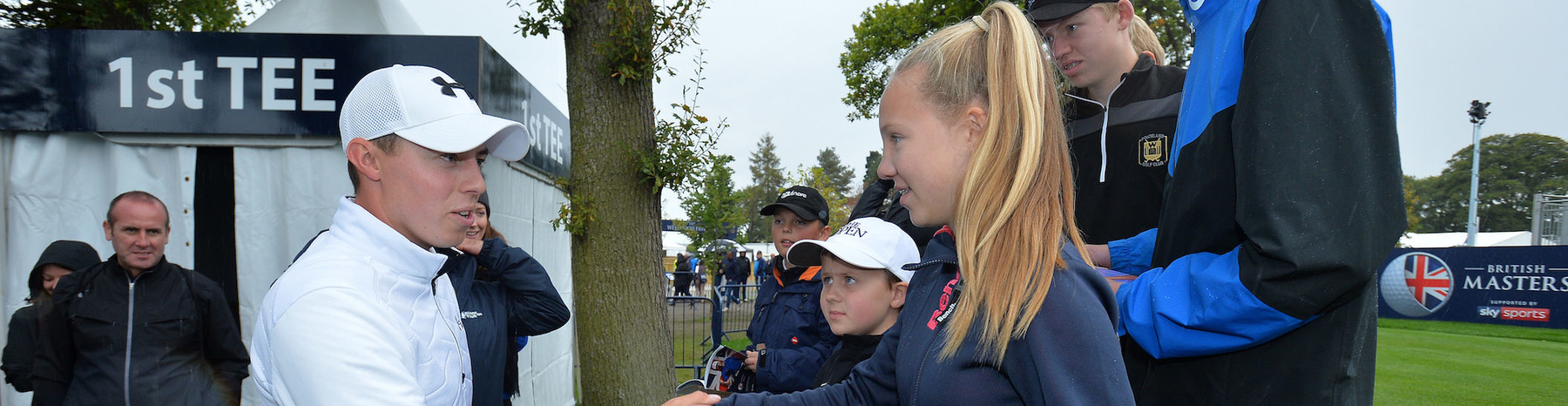 NEWCASTLE UPON TYNE, ENGLAND - SEPTEMBER 30:   Matthew Fitzpatrick of England meets children from the Junior Golf Sixes Academy at Ponteland Golf Club who won the Junior Golf Sixes Tournament held at Close House at the beginning of September, during the third day of the British Master at Close House Golf Club on September 30, 2017 in Newcastle upon Tyne, England. (Photo by Mark Runnacles/Getty Images)