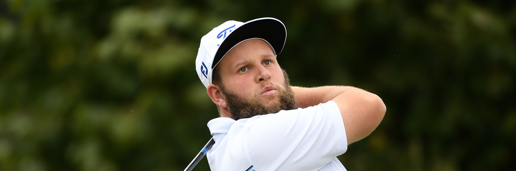 WATFORD, ENGLAND - OCTOBER 15:  Andrew Johnston of England hits his tee shot on the third hole during the third round of the British Masters at The Grove on October 15, 2016 in Watford, England.  (Photo by Ross Kinnaird/Getty Images)
