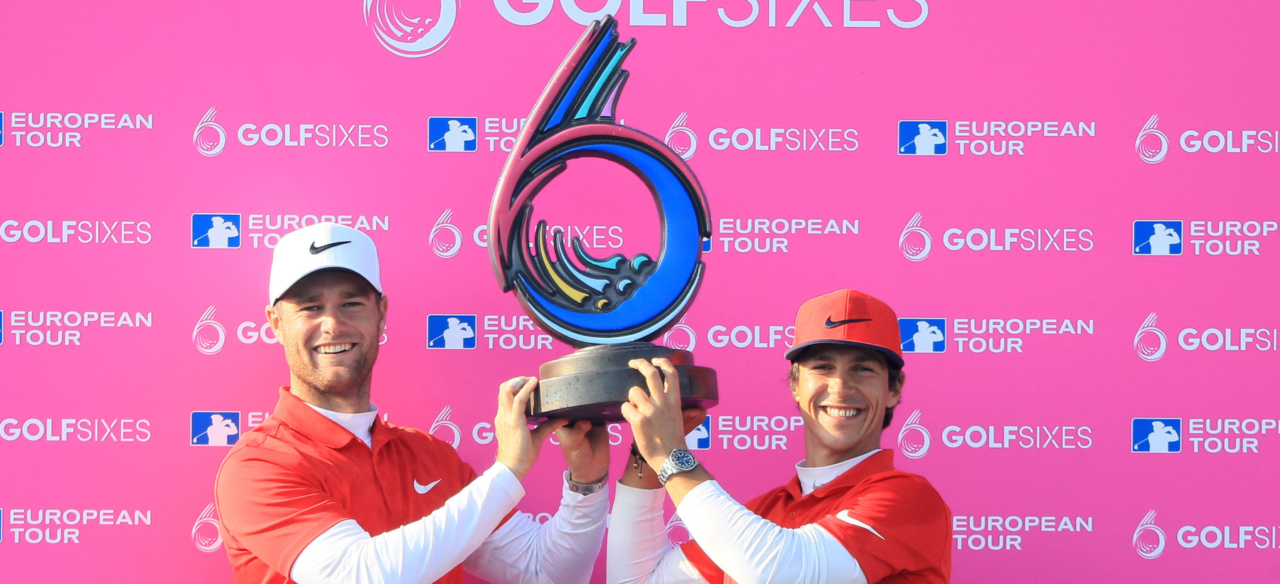 ST ALBANS, ENGLAND - MAY 07:  Thorbjorn Olesen and Lucas Bjerregaard of Denmark pose with the trophy after winning the final match between Denmark and Australia during day two of GolfSixes at The Centurion Club on May 7, 2017 in St Albans, England.  (Photo by Andrew Redington/Getty Images)