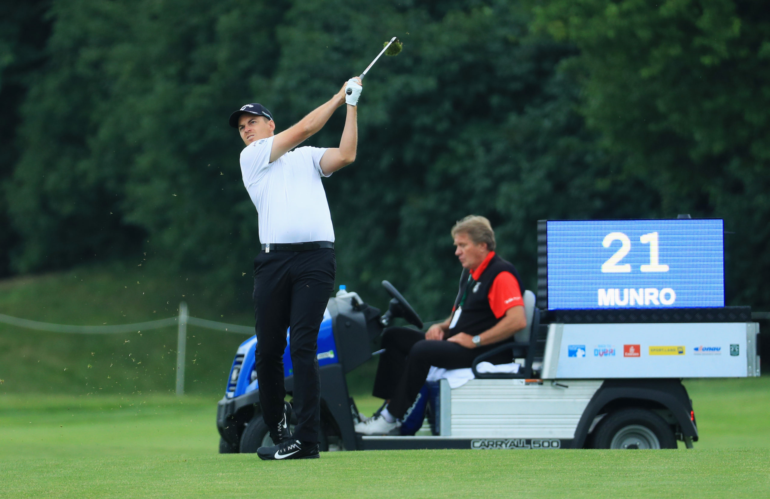 ATZENBRUGG, AUSTRIA - JUNE 07:  Jack Munro of Australia plays his second shot on the 7th hole alongside the 'shot clock' during day one of the 2018 Shot Clock Masters  at Diamond Country Club on June 7, 2018 in Atzenbrugg, Austria.  (Photo by Matthew Lewis/Getty Images)