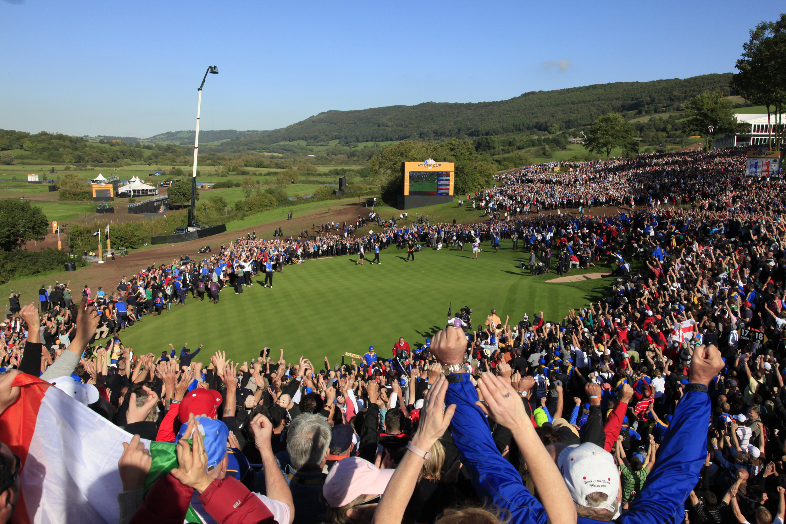 2010 Ryder Cup Matches, Twenty Ten Course, Celtic Manor Resort , City of Newport, Wales. 1- 3 October 2010..Thousands of golf fans surrounding the 17th start to celebrate as Graeme McDowell wins the crucial point for Europe..Mondays Singles.Photo Credit: Phil INGLIS - SPORTINGWALES
