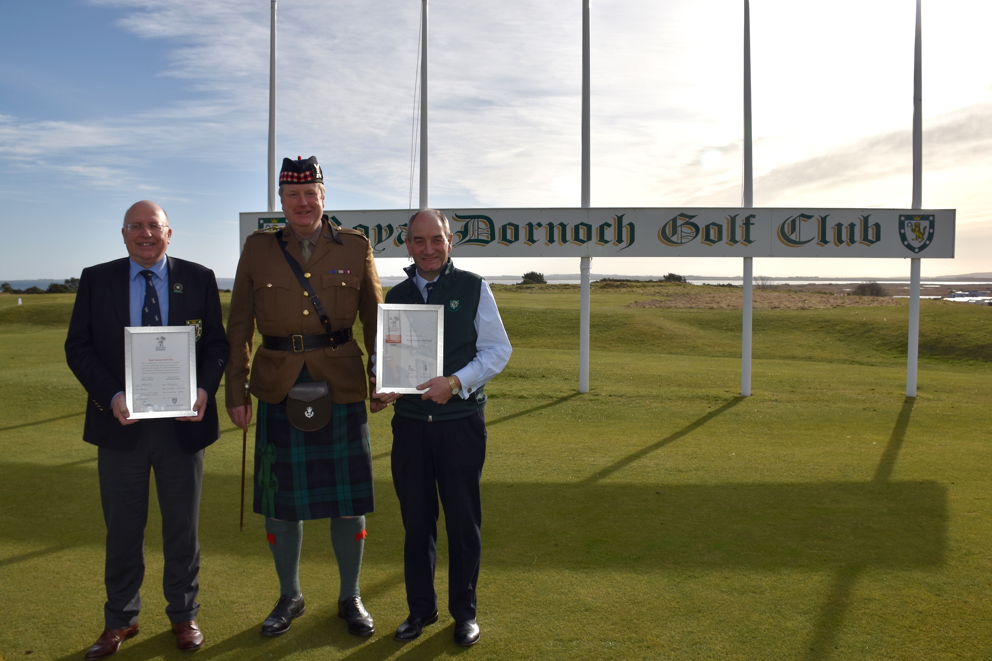 Royal Dornoch captain Rob Murray, Major Alec Rose, Battalion second in command, 7 SCOTS. and club general manager Neil Hampton