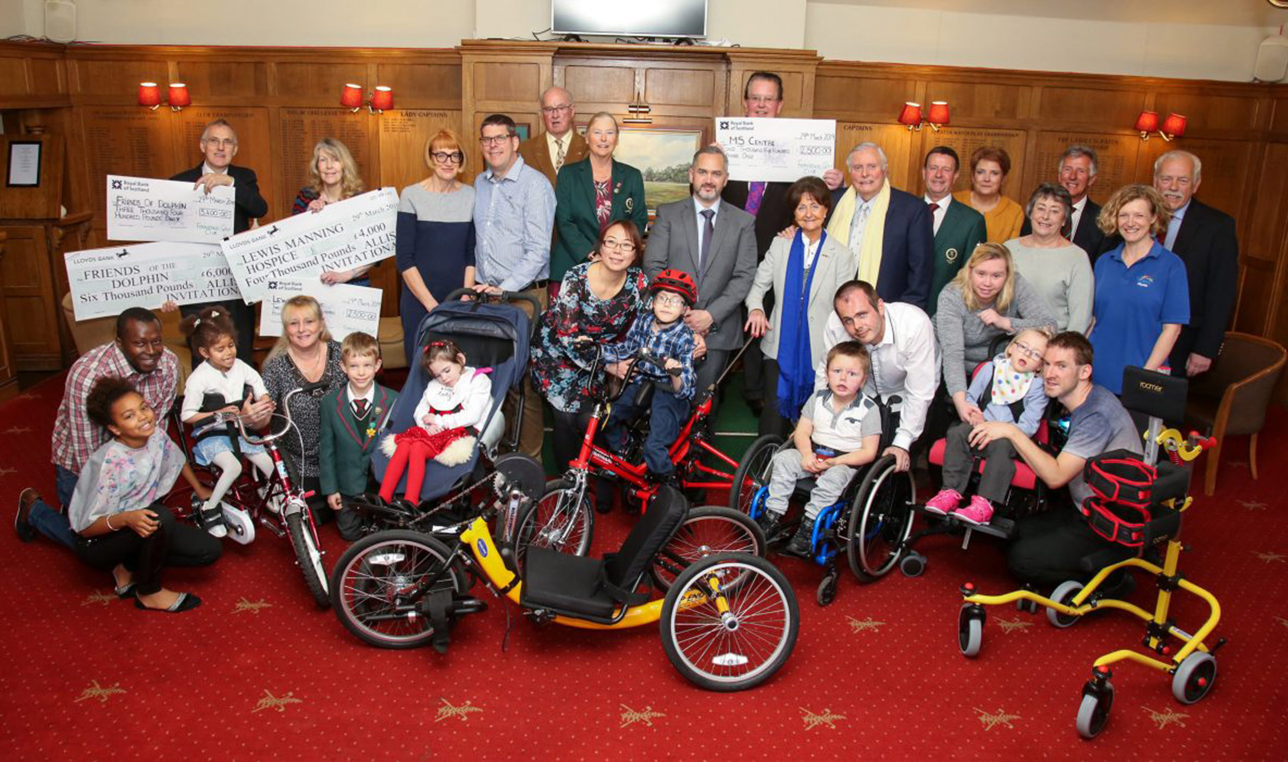 Peter Alliss last year when he presented disabled youngsters with mobility aids