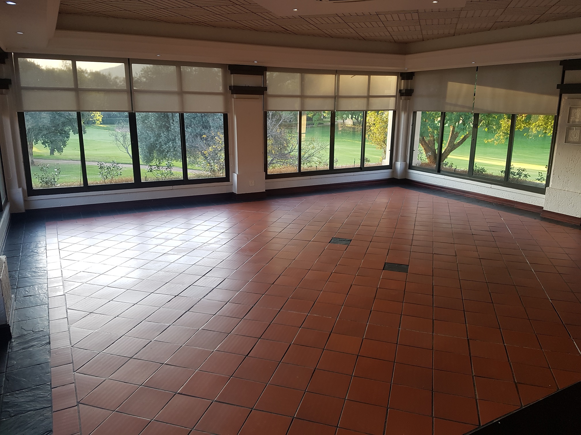 Pecanwood Country Club’s normally busy restaurant area shut down and the view of the empty fairways beyond through the plate glass windows!