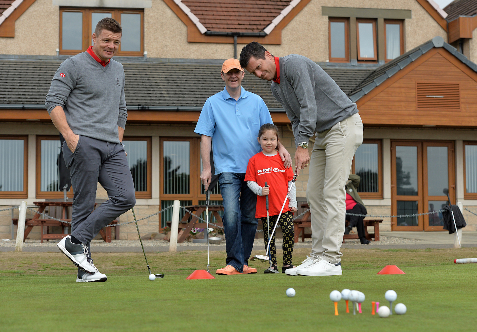 Tim Henman and Brian O'Driscoll at The Open with the Golf Foundation